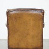 Sheepskin leather armchair with character and a touch of Art Deco design