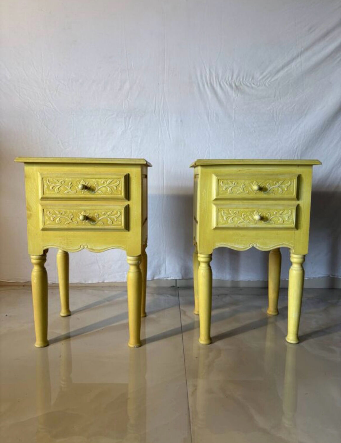 Pair of vintage carved wooden bedside tables.