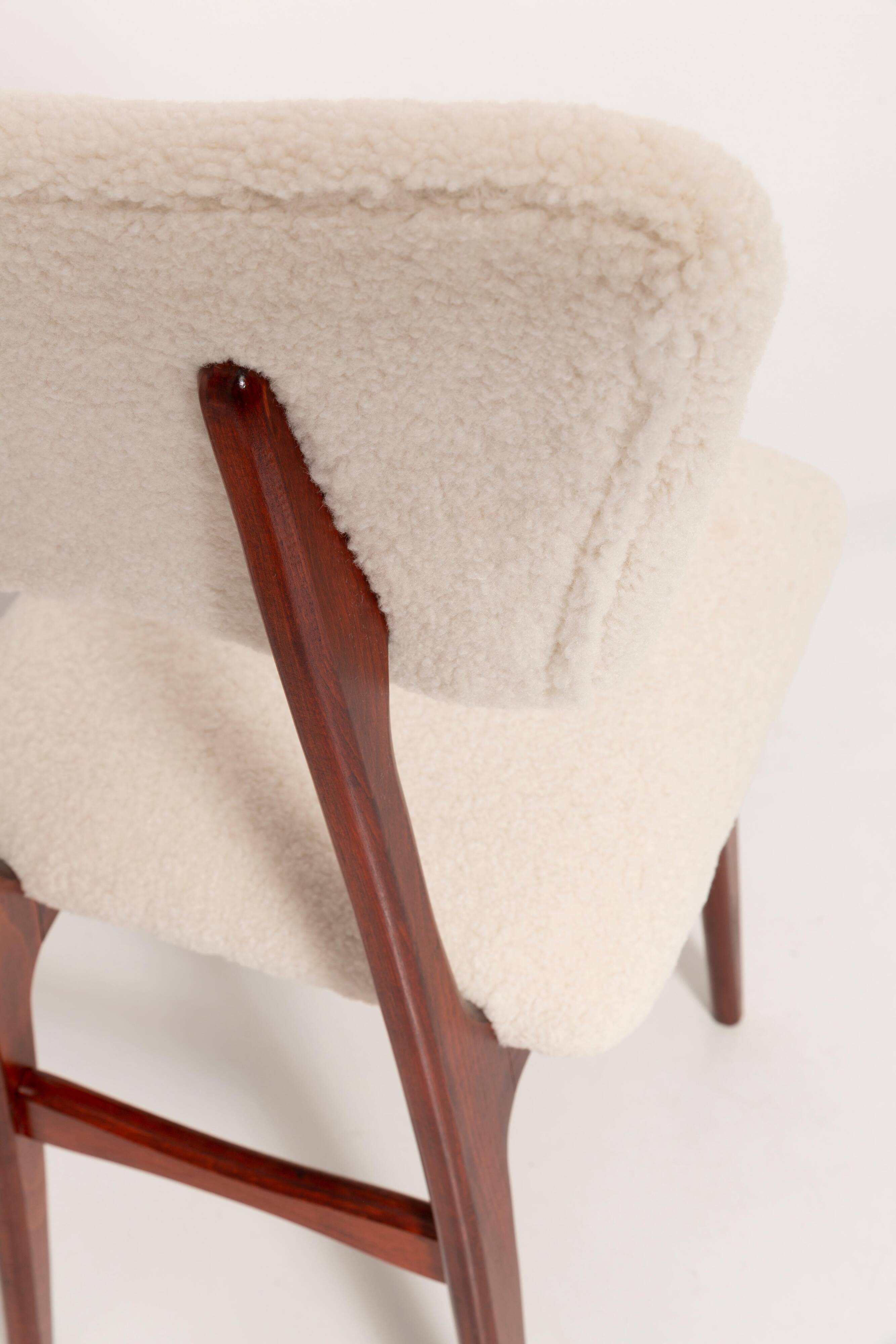 Beech wood armchair in cherry colour with cream boucle fabric - 20th century, Europe, 1960.