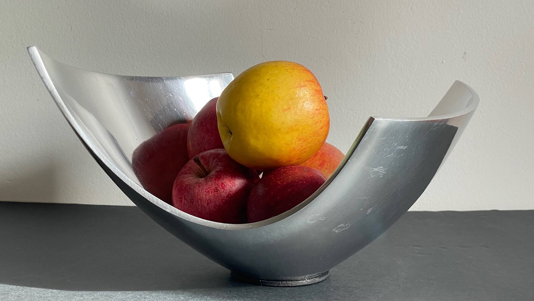 Vintage polished metal fruit bowl