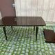 Scandinavian extendable dining table made of solid wood and rosewood effect.
