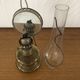 Oil lamp with glass pedestal and integrated round mirror