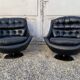 Pair of vintage swivel armchairs in black leather Tulip foot