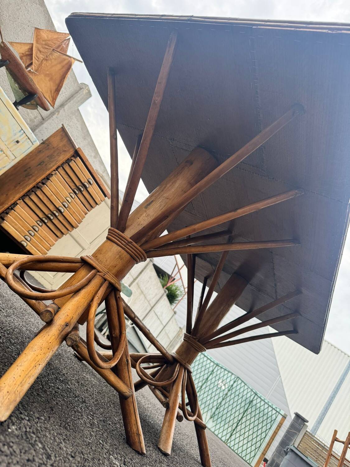Vintage 1950s set: large table with tripod base and benches in woven chestnut