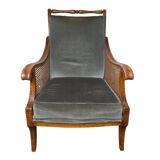 Regency style bergère armchair in wood, fabric and cane