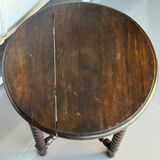 Antique turned wooden side table with authentic charm.