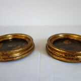Set of 2 paintings in oval frames