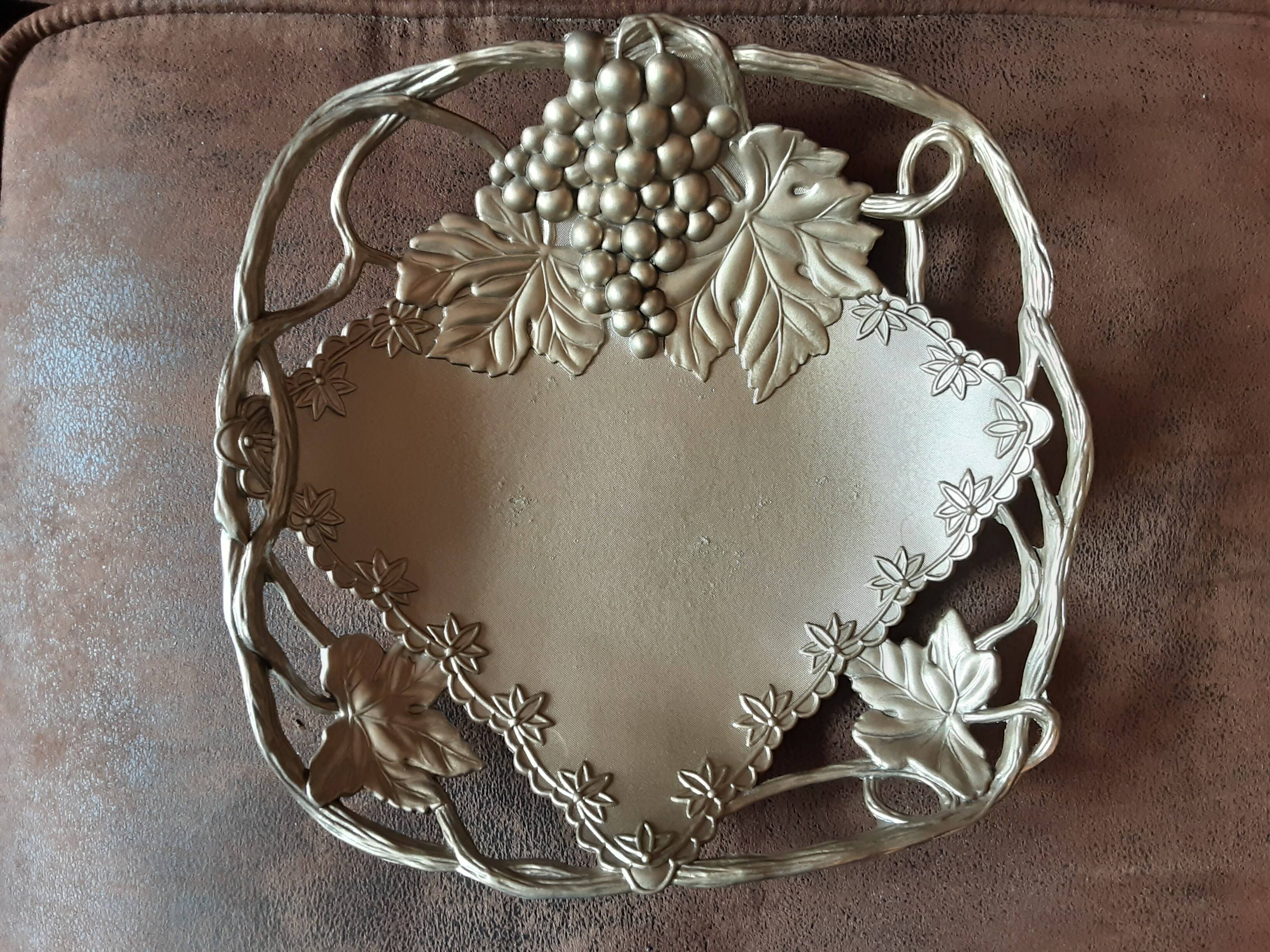 Metal basket with vine decor