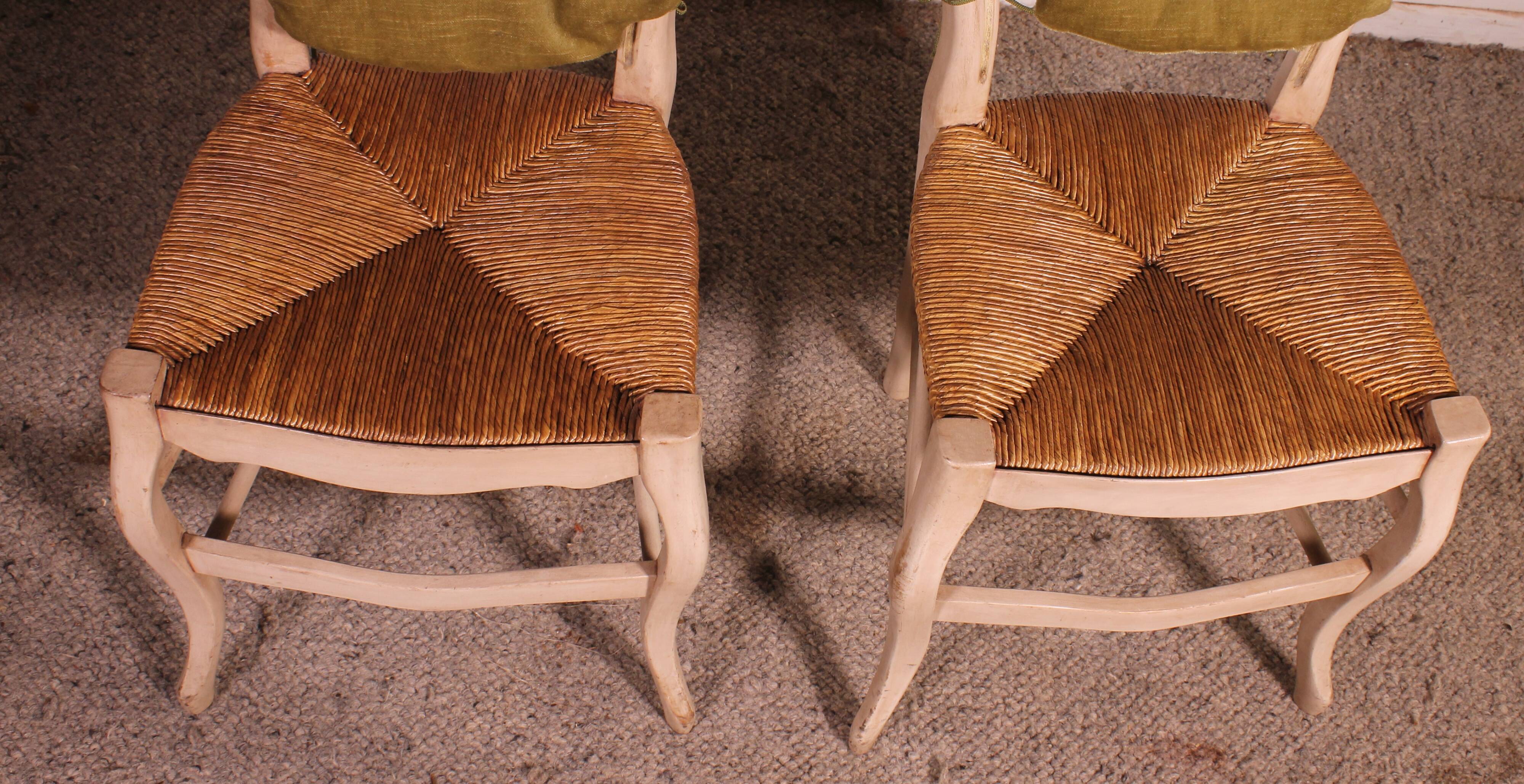 2 chaises paillées en bois polychrome