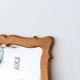 Very large vintage mirror in scrolled solid oak