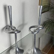 Pair of large aluminium bow candlesticks, Italy, 1970.