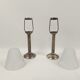 Pair of metal candlesticks with glass lampshade
