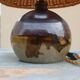 Vernified and rattan sandstone lamp
