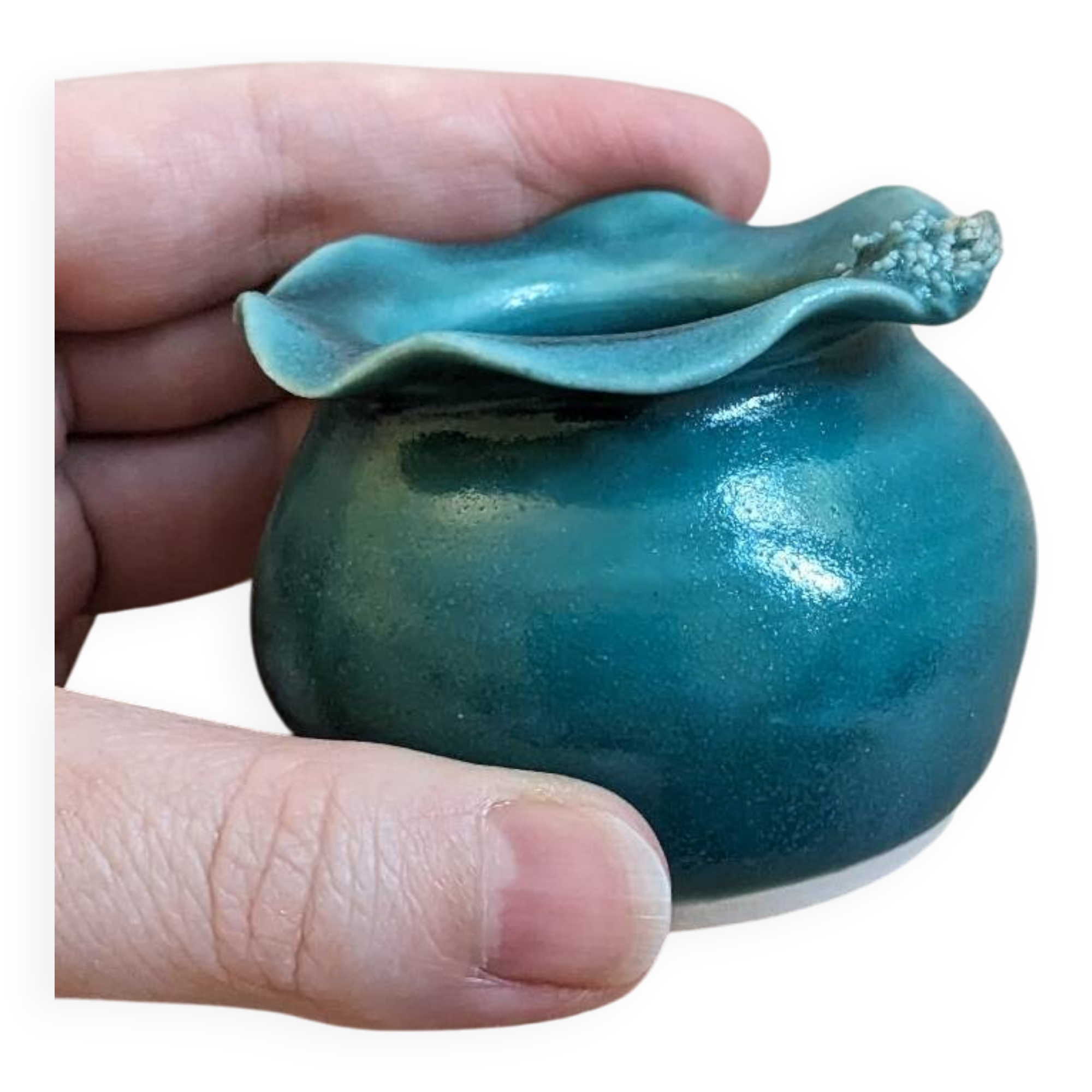 Small handmade turquoise pottery.