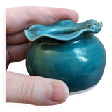 Small handmade turquoise pottery.