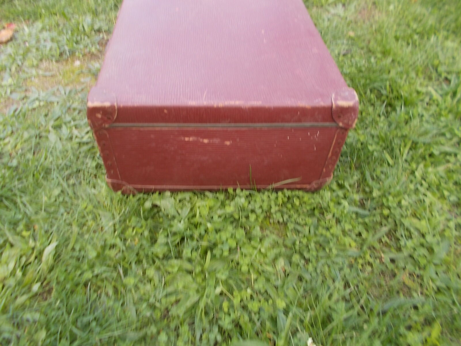 Vintage burgundy suitcase