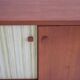 Buffet Ilmari Tapiovaara in teak with fabric and brass details.