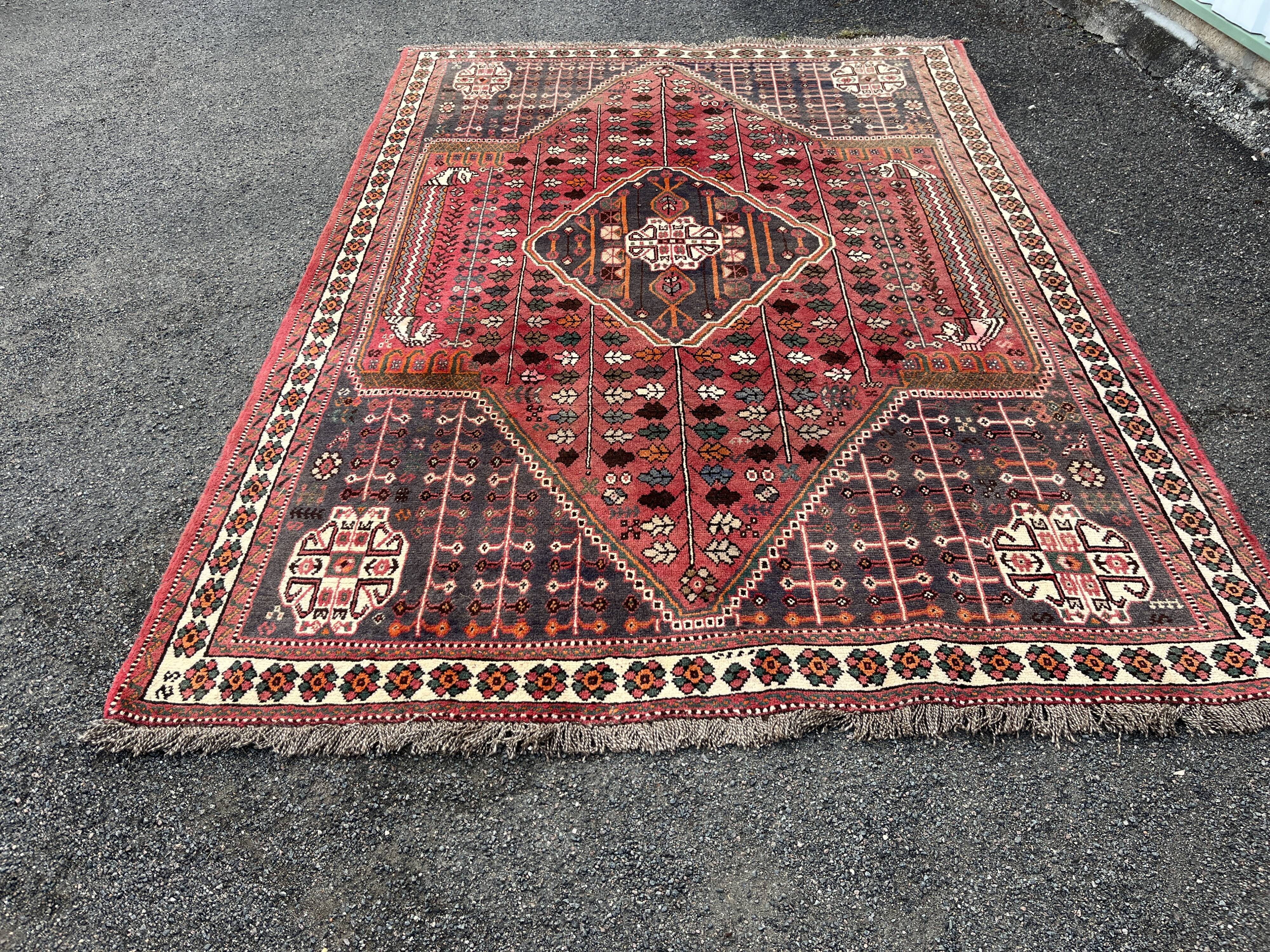 Large red Persian wool rug with red geometric design 2.97 x 2.05 m