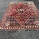 Large red Persian wool rug with red geometric design 2.97 x 2.05 m