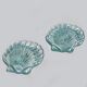 Pair of shell candlesticks