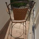 Wicker armchair and wrought iron