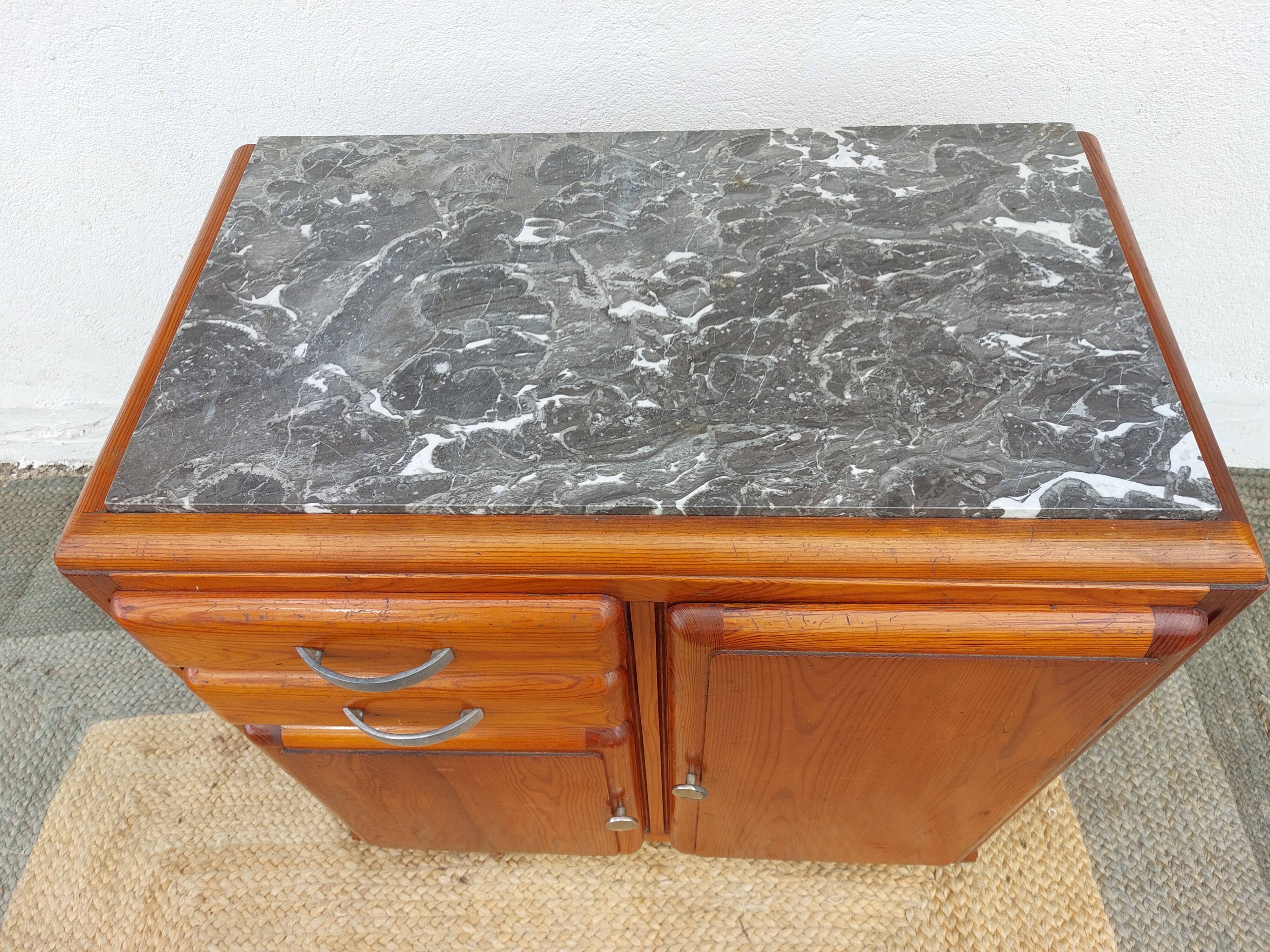 Mado buffet, marble top and asymmetrical doors.