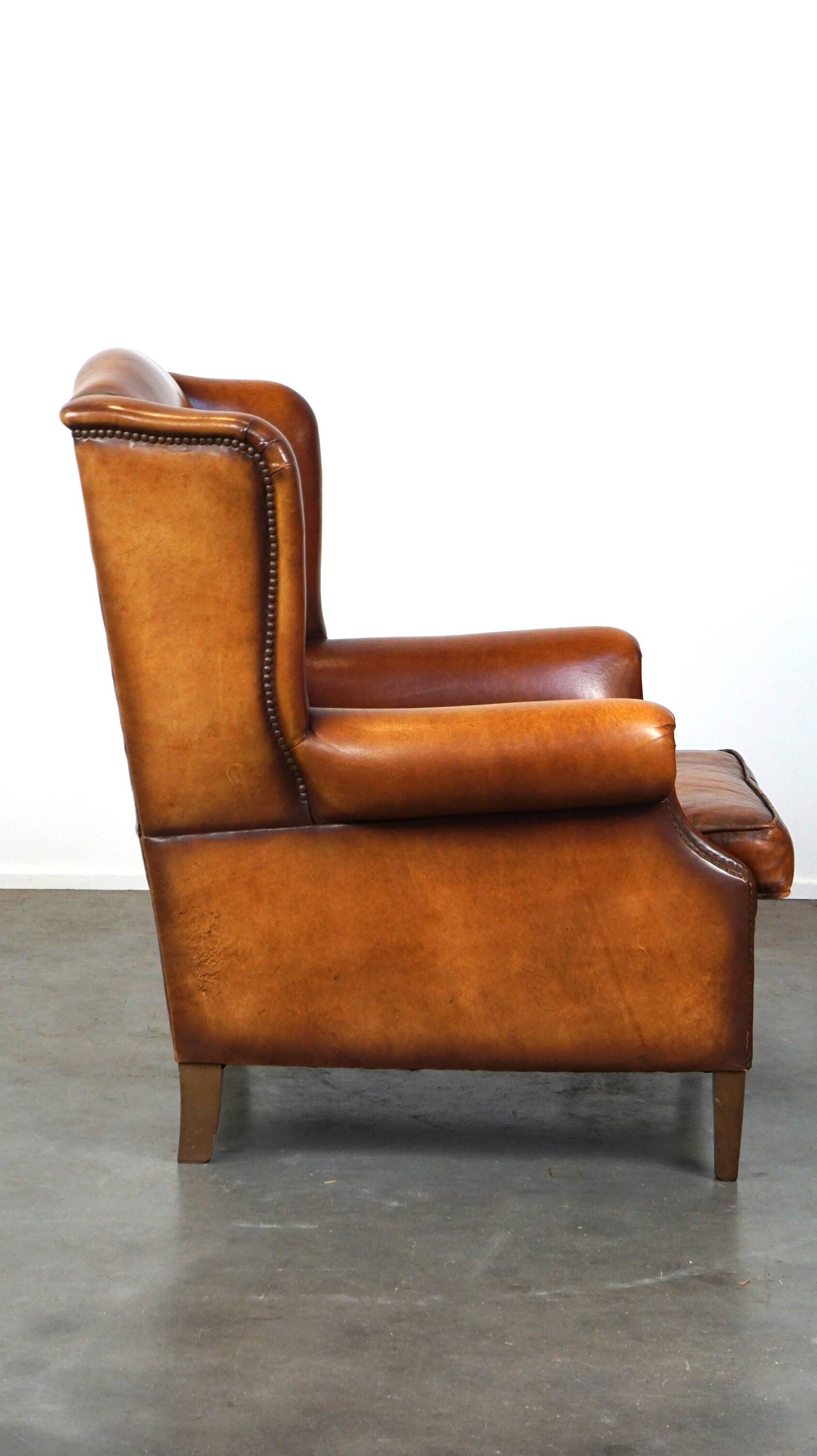 Beautiful and Comfortable Sheepskin Wingback Armchair with a Wonderful Patina