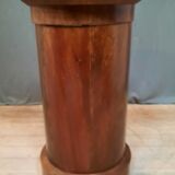 Circular mahogany selette