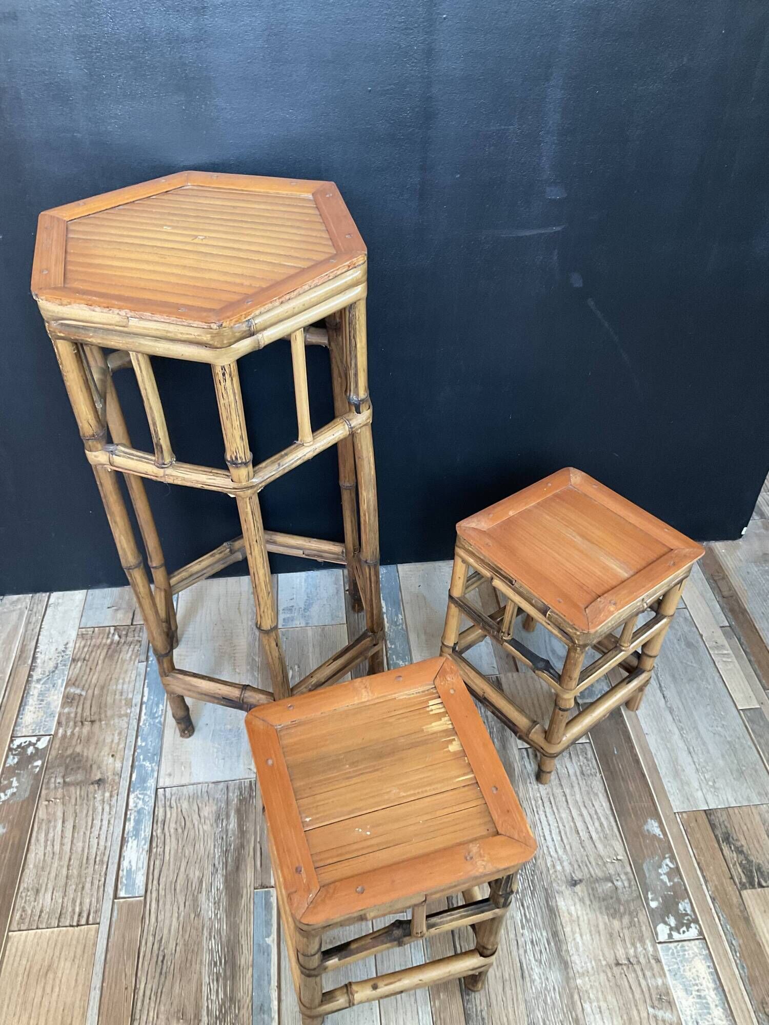 Trio of vintage rattan plant holders in the 60s