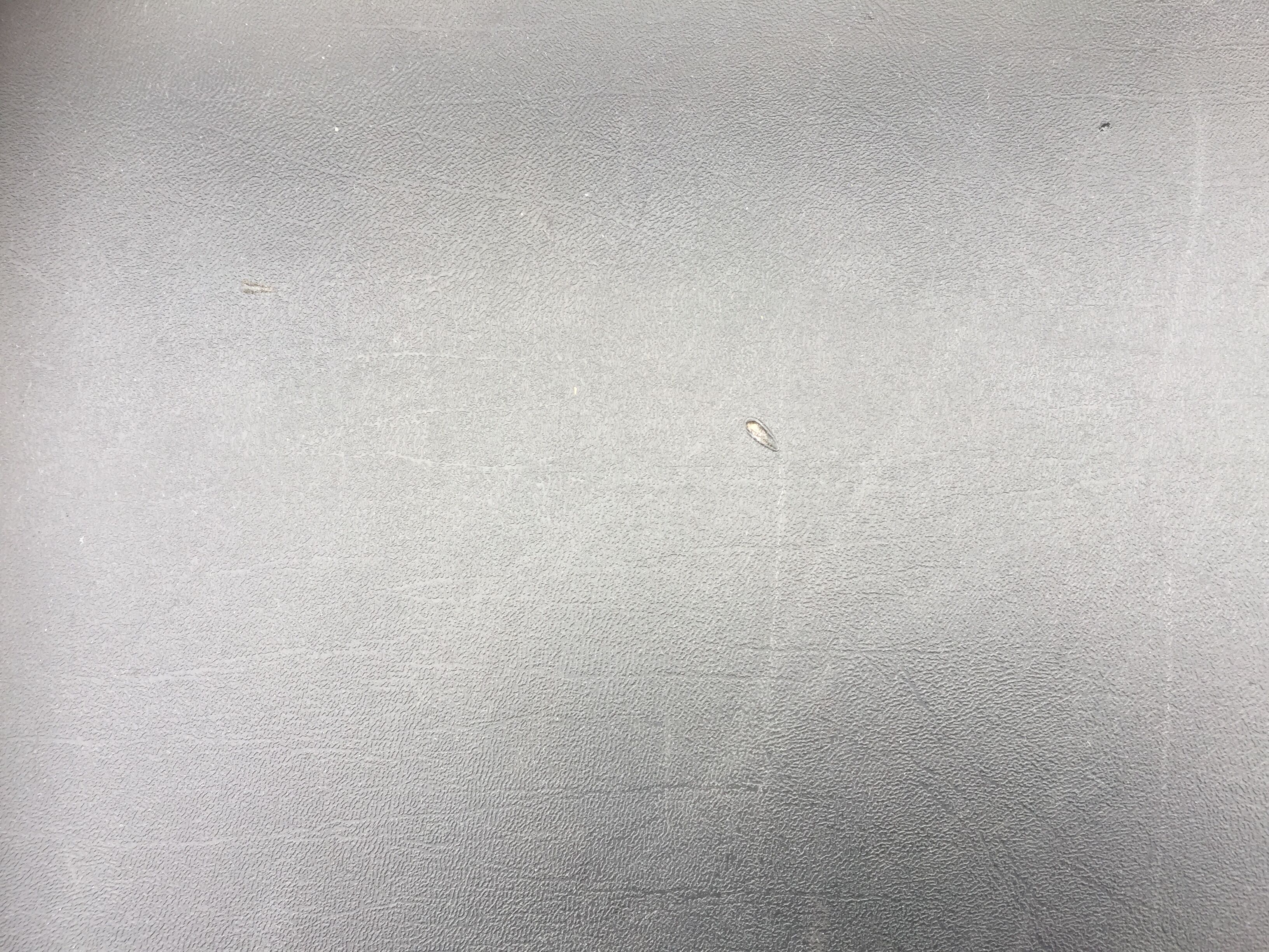 Design armchair with chrome metal tubular base and seat in black Skaï