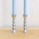 Pair of vintage cast aluminum candle holders