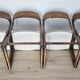 Set of 4 vintage Baumann "Sled" chairs in bent wood.