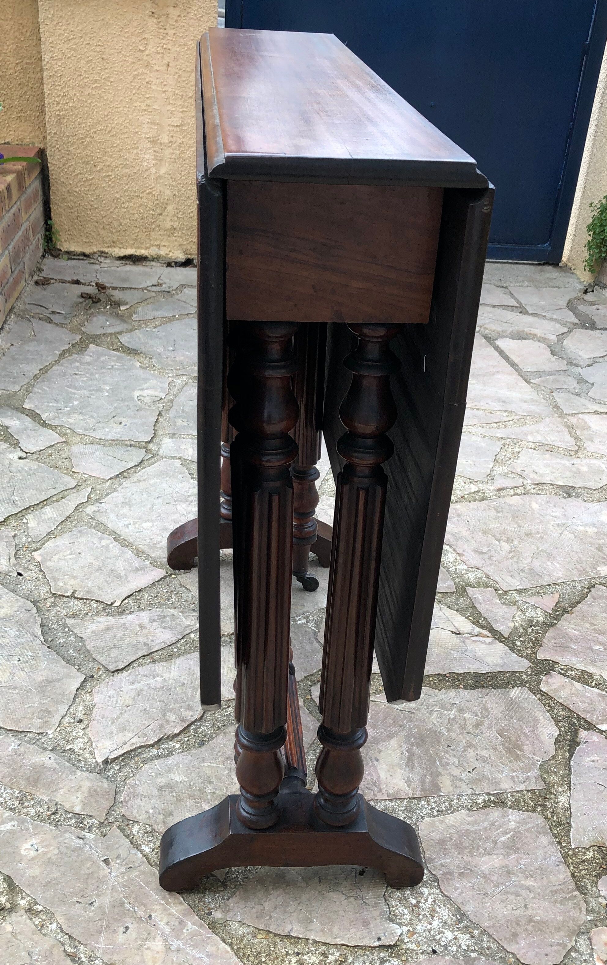 Side table with flaps