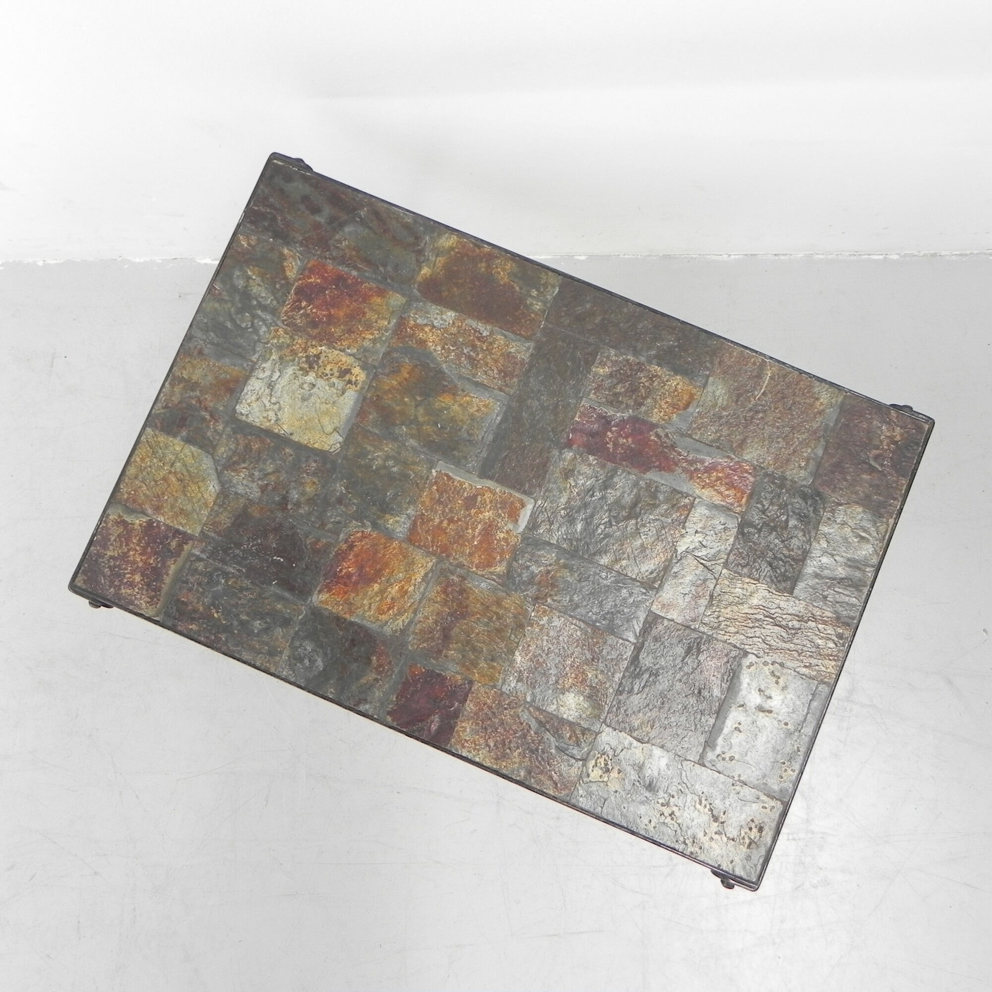 Brutalist coffee table with slate top