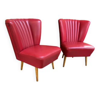 Pair of mid-century cocktail chairs in purple vinyl and beech, 1950s.