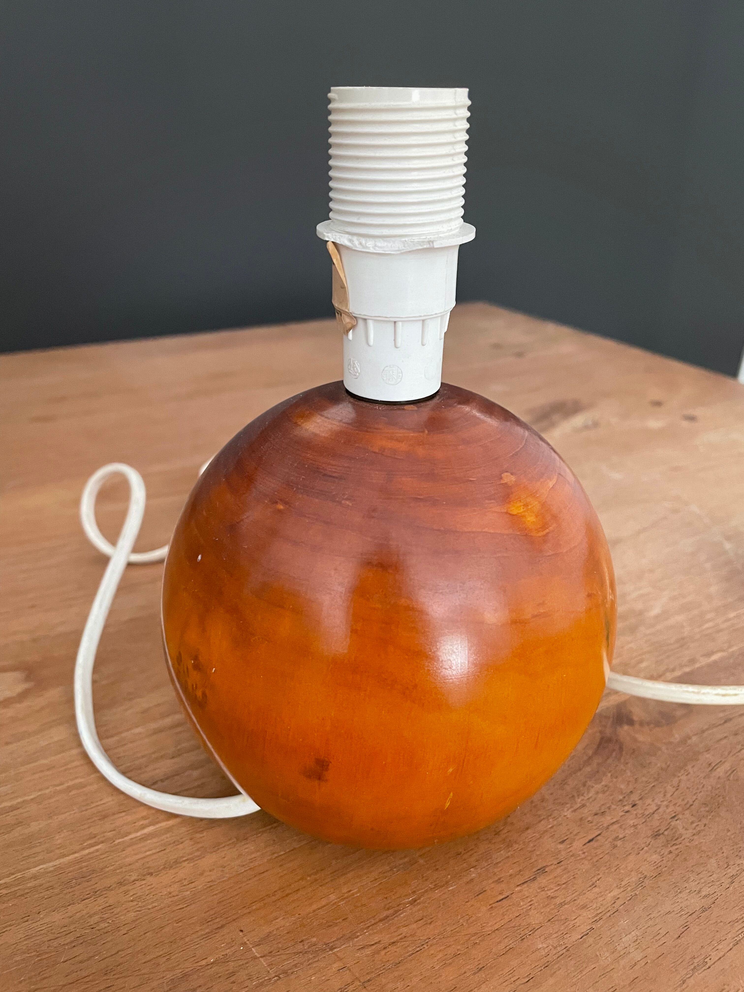 Turned wooden table lamp