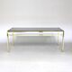 Table basse en verre et métal doré