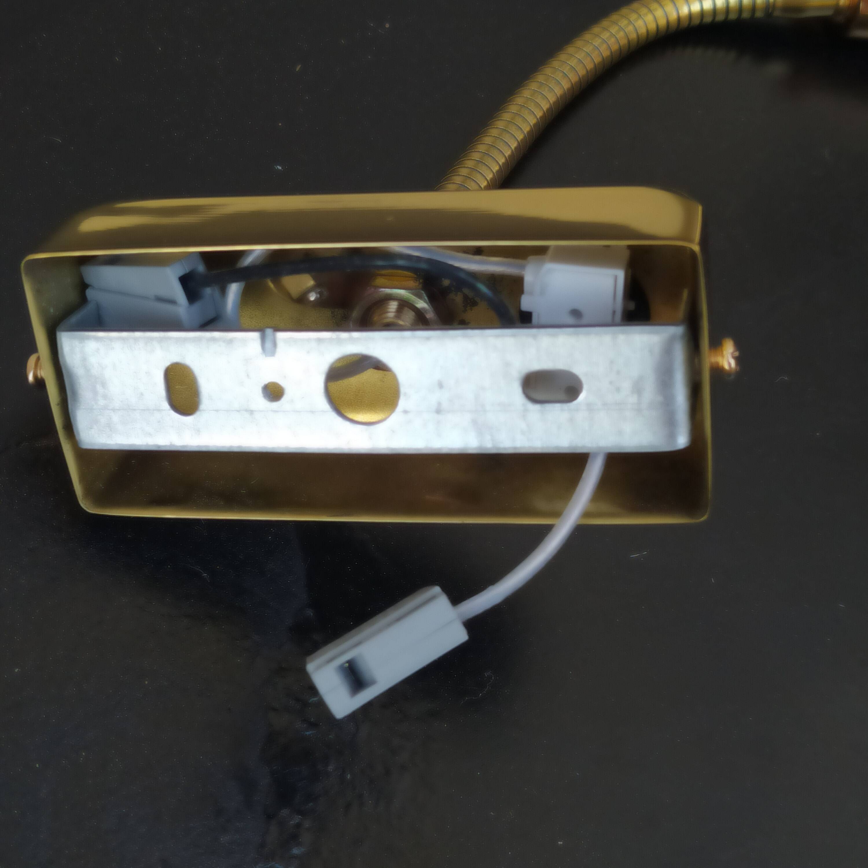 Pair of golden wall lights from the brossier saderne brand