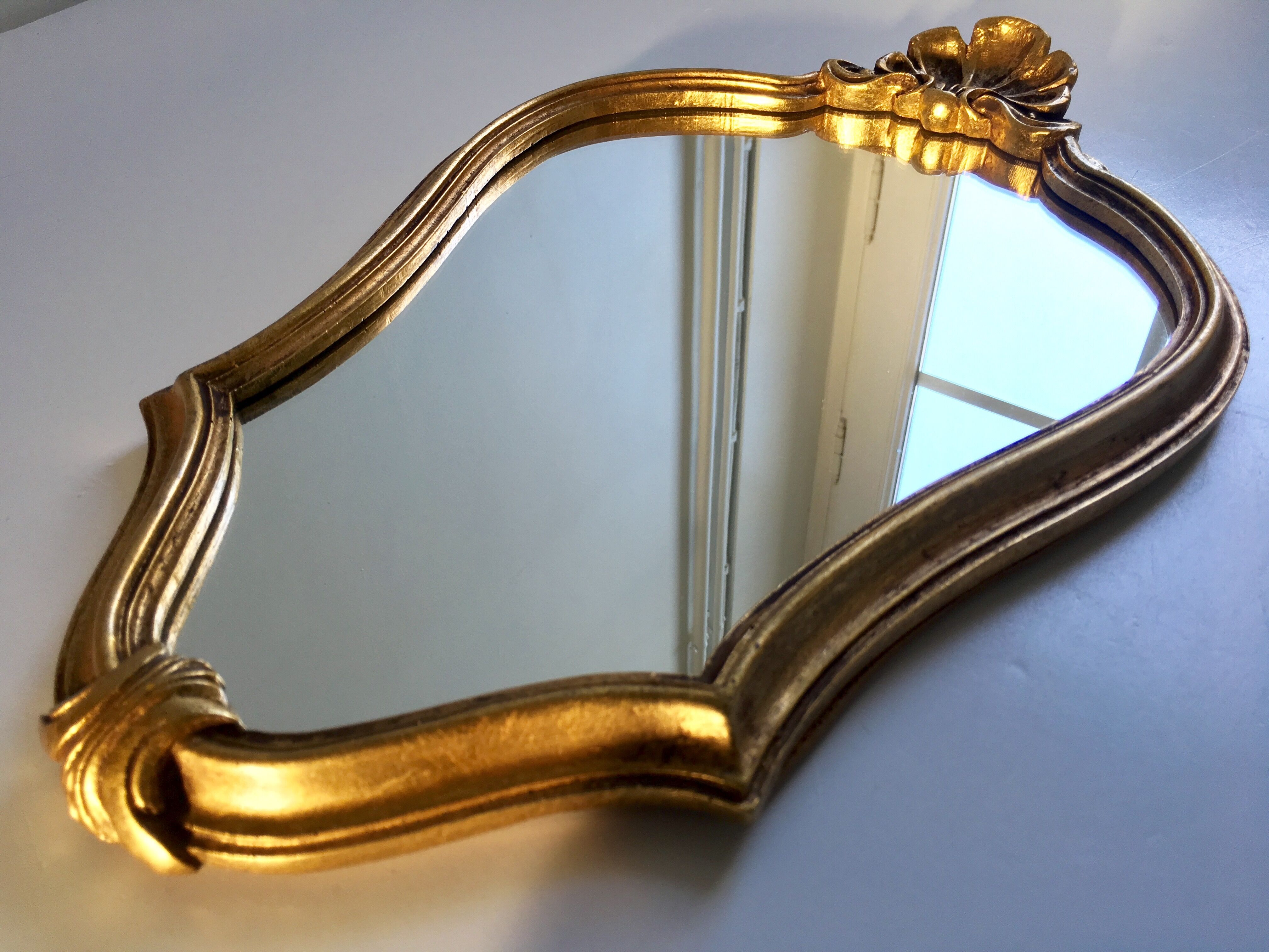 Mirror rocked carved and gilded wood 30x45cm