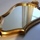 Miroir rocaille bois sculpté et doré 30x45cm