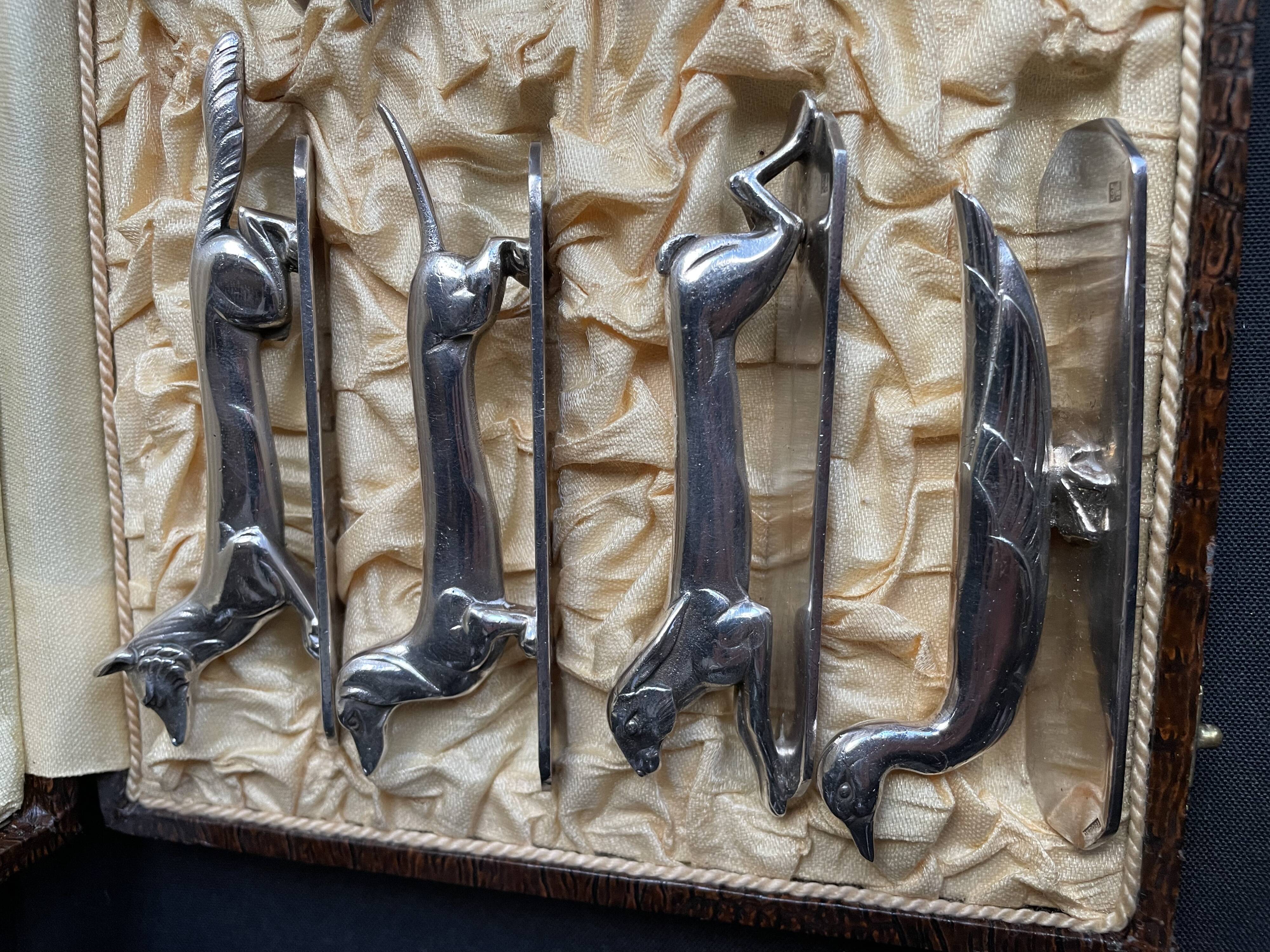 12 “Modern Animals” knife holders – Silvered bronze – Art Deco
