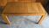 Table à manger extensible Maison Regain en bois d'orme massif