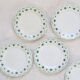 Set de 9 assiettes plates HBC Choisy le Roi, motif géométriques et floraux vert et bleu, vintage fra