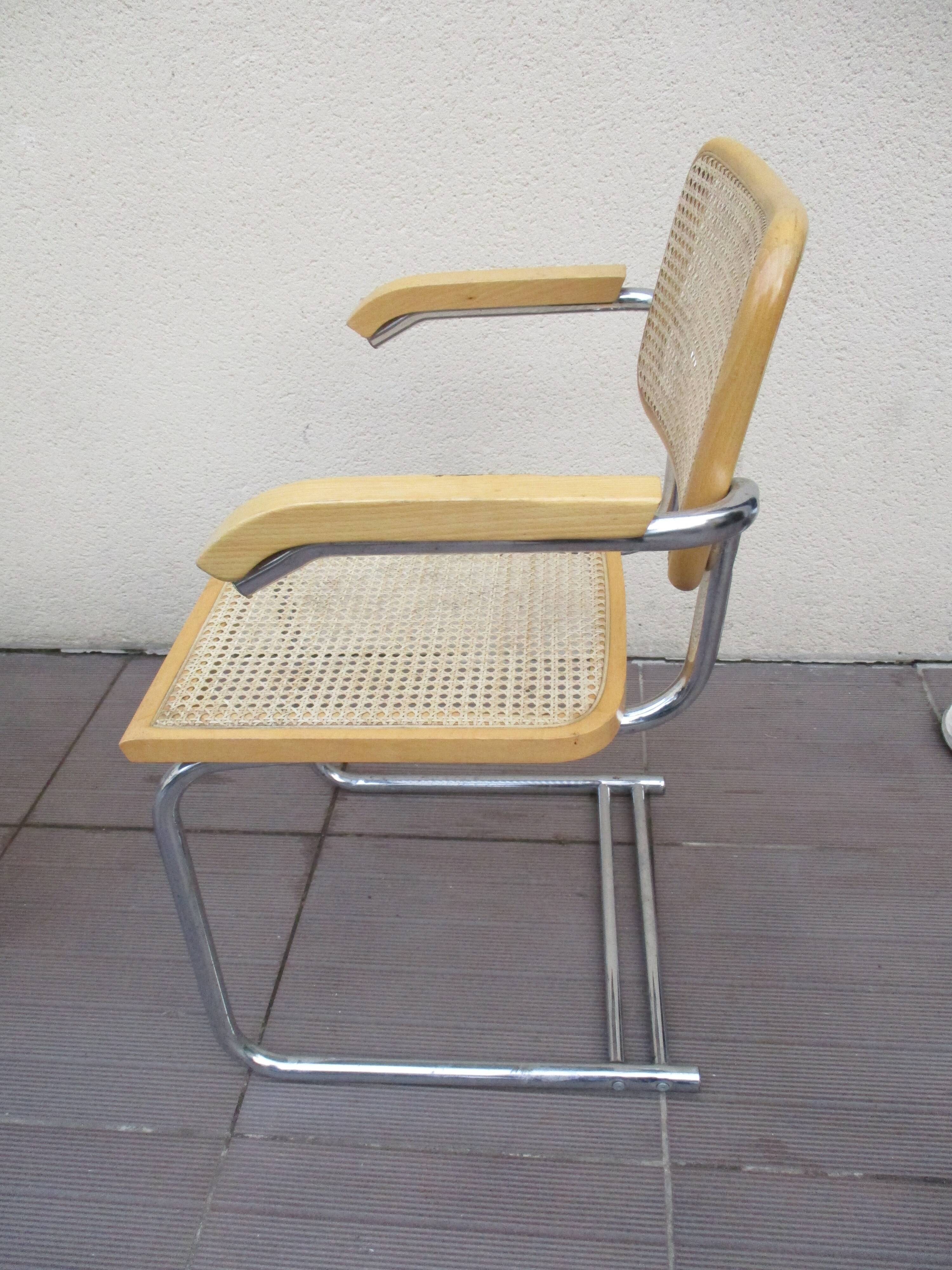 Fauteuil canné tubulaire chromé