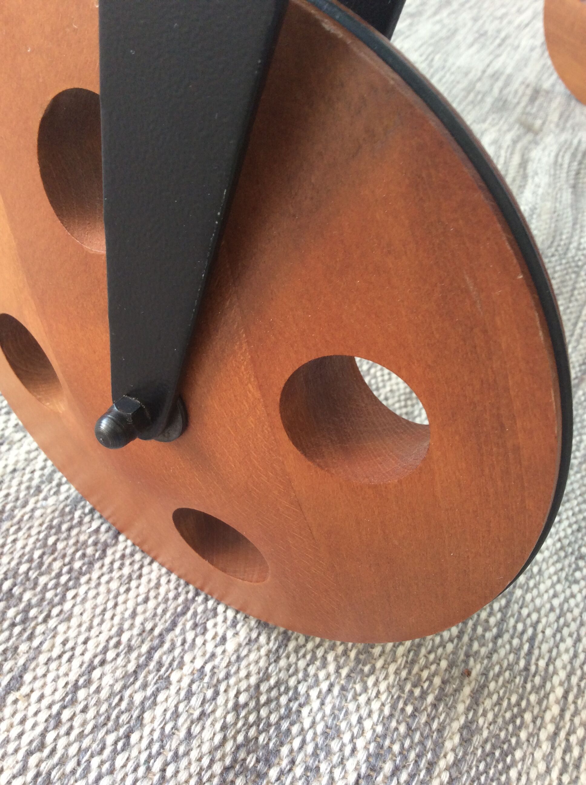 Glass coffee table on teak wheels