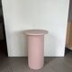round and fluted bedside table in dusty pink