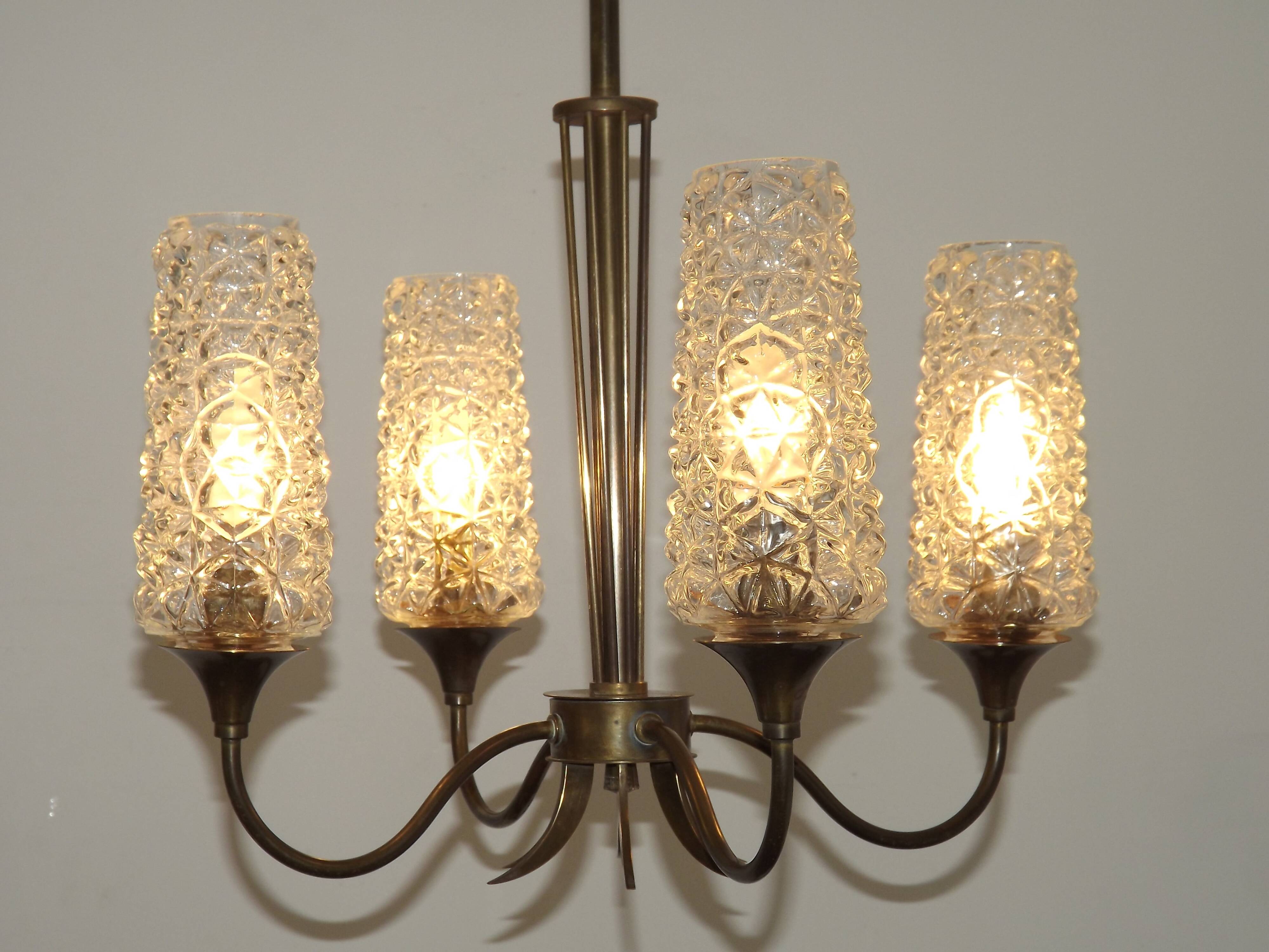 French vintage retro chandelier with 4 lights in brass and bronze with cut glass shades.