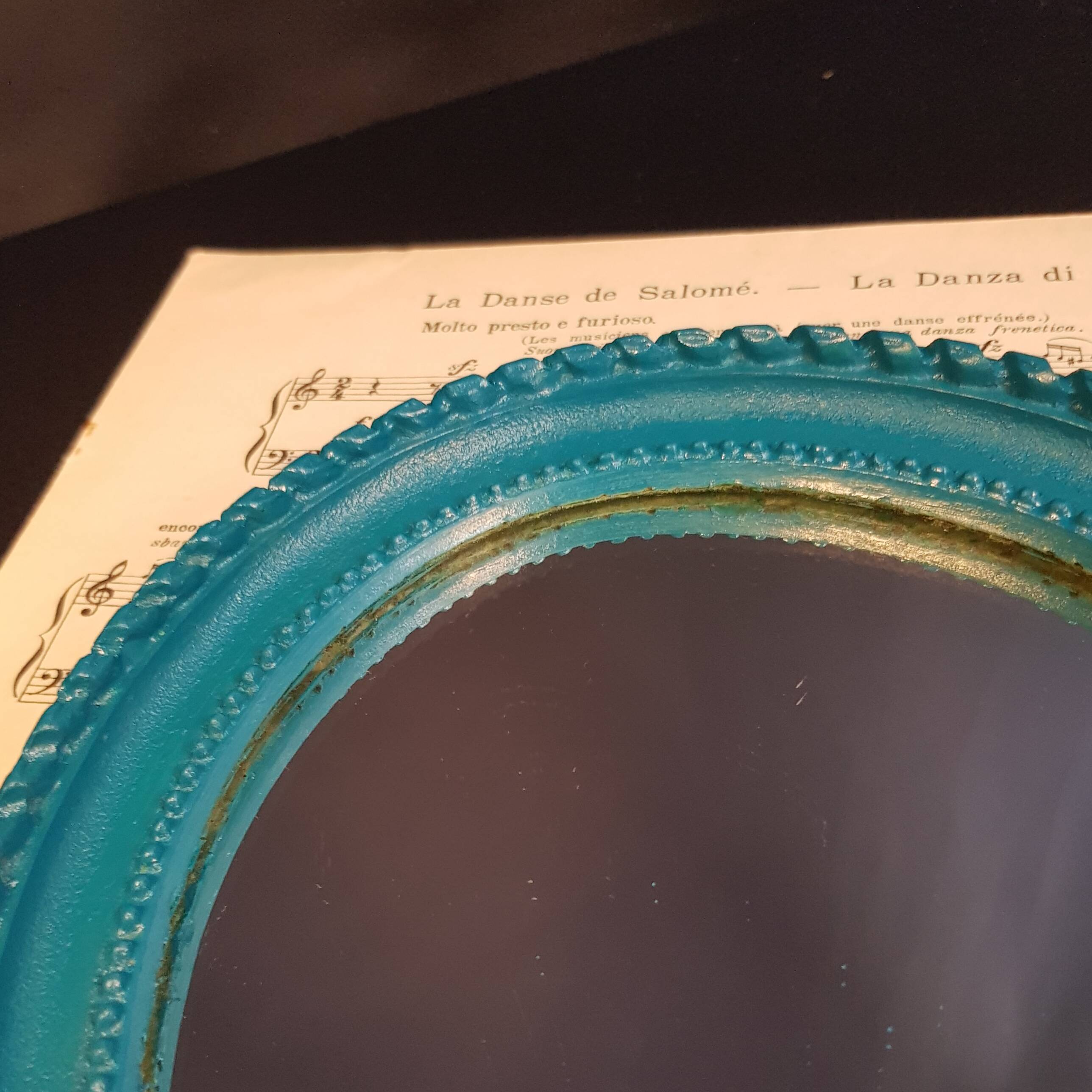 Small turquoise oval mirror
