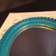 Small turquoise oval mirror