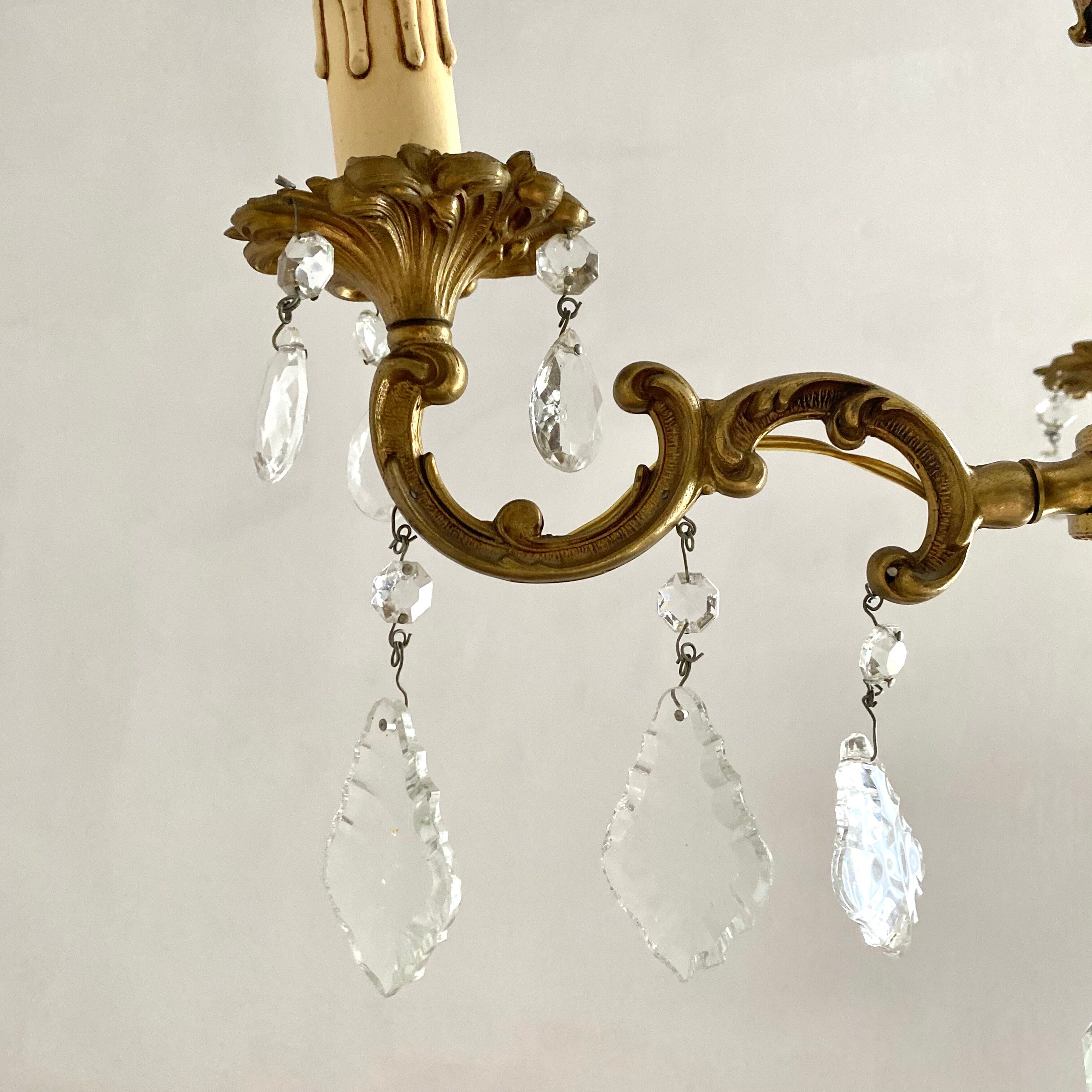 Chandelier with tassels and brass